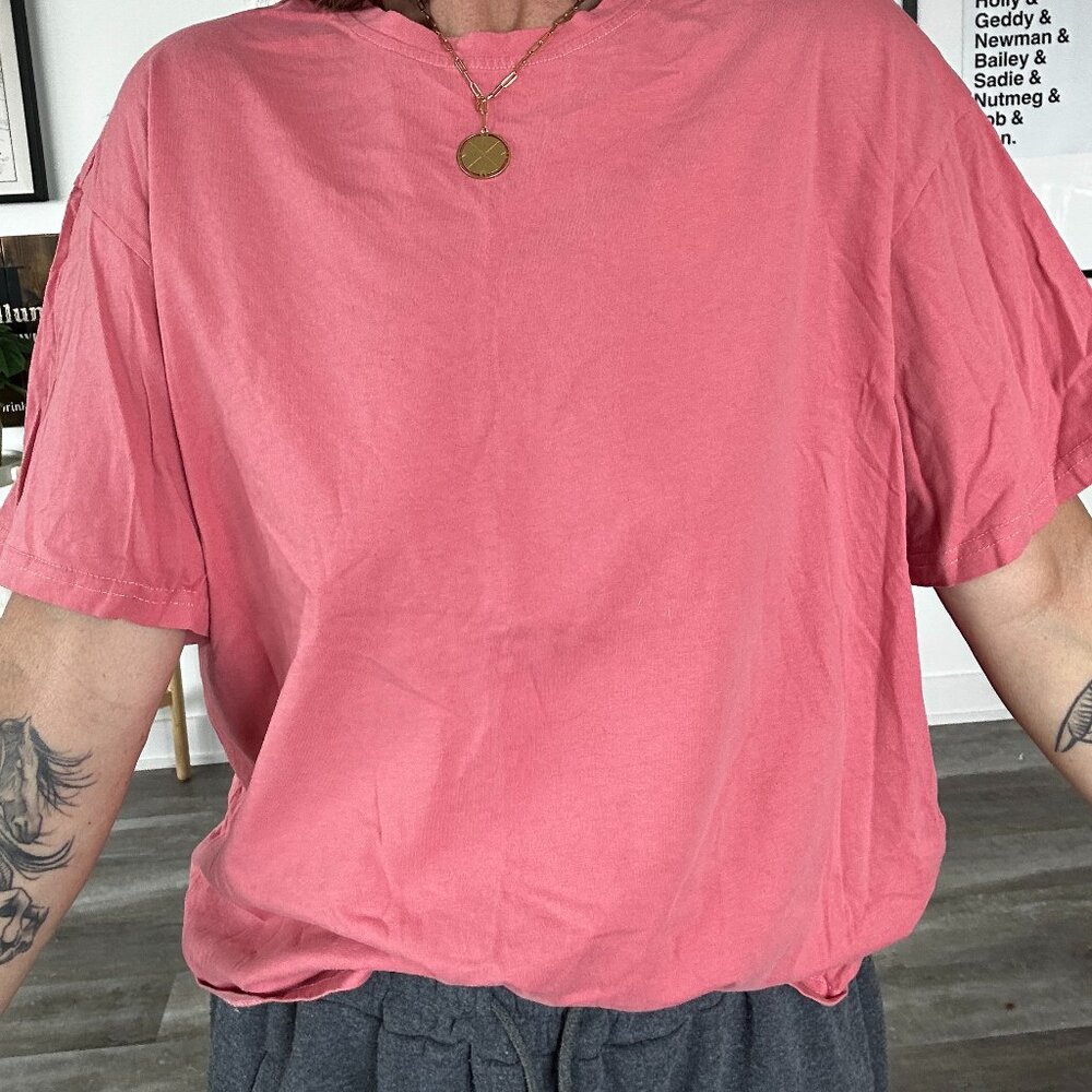 Coral tshirt w/ heart cut-out. Size L.